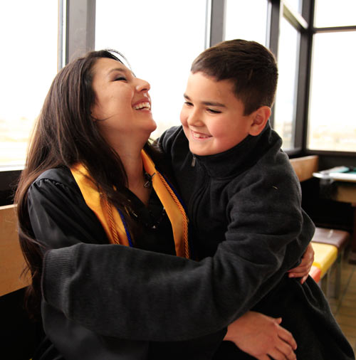 SIPI Graduate Alanna Palmer and her son before Graduation.