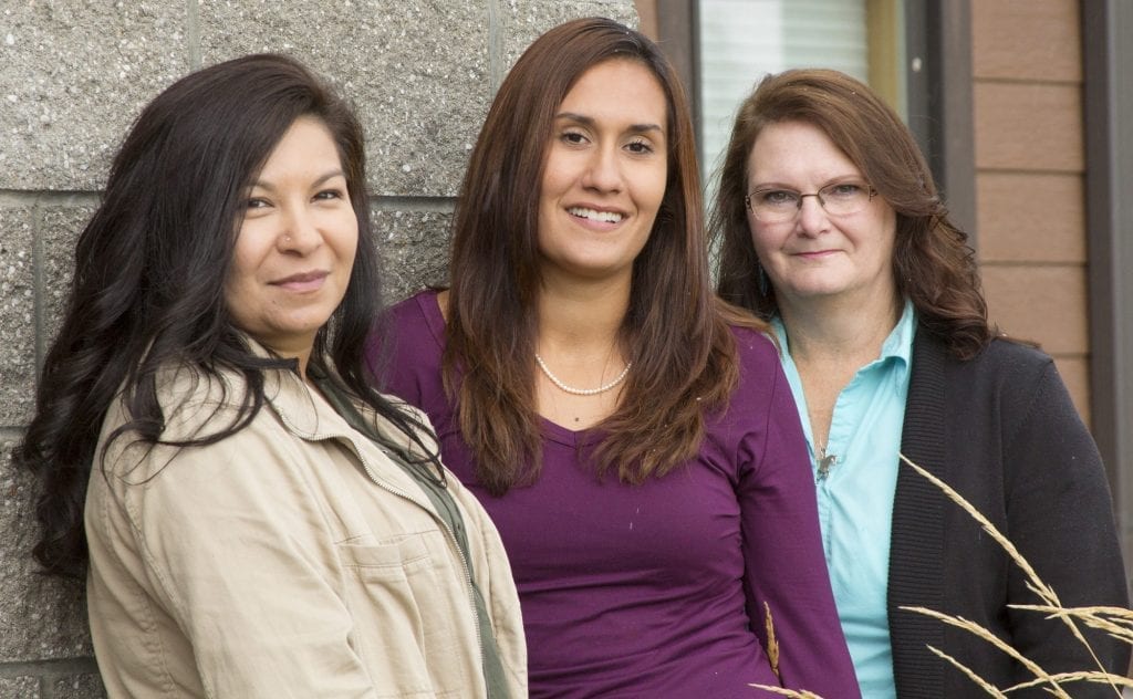 SKC Indigenous Visionaries Fellows Joni Augare Connelly, Kayla Dix, and Mentor Kathie Maiers.
