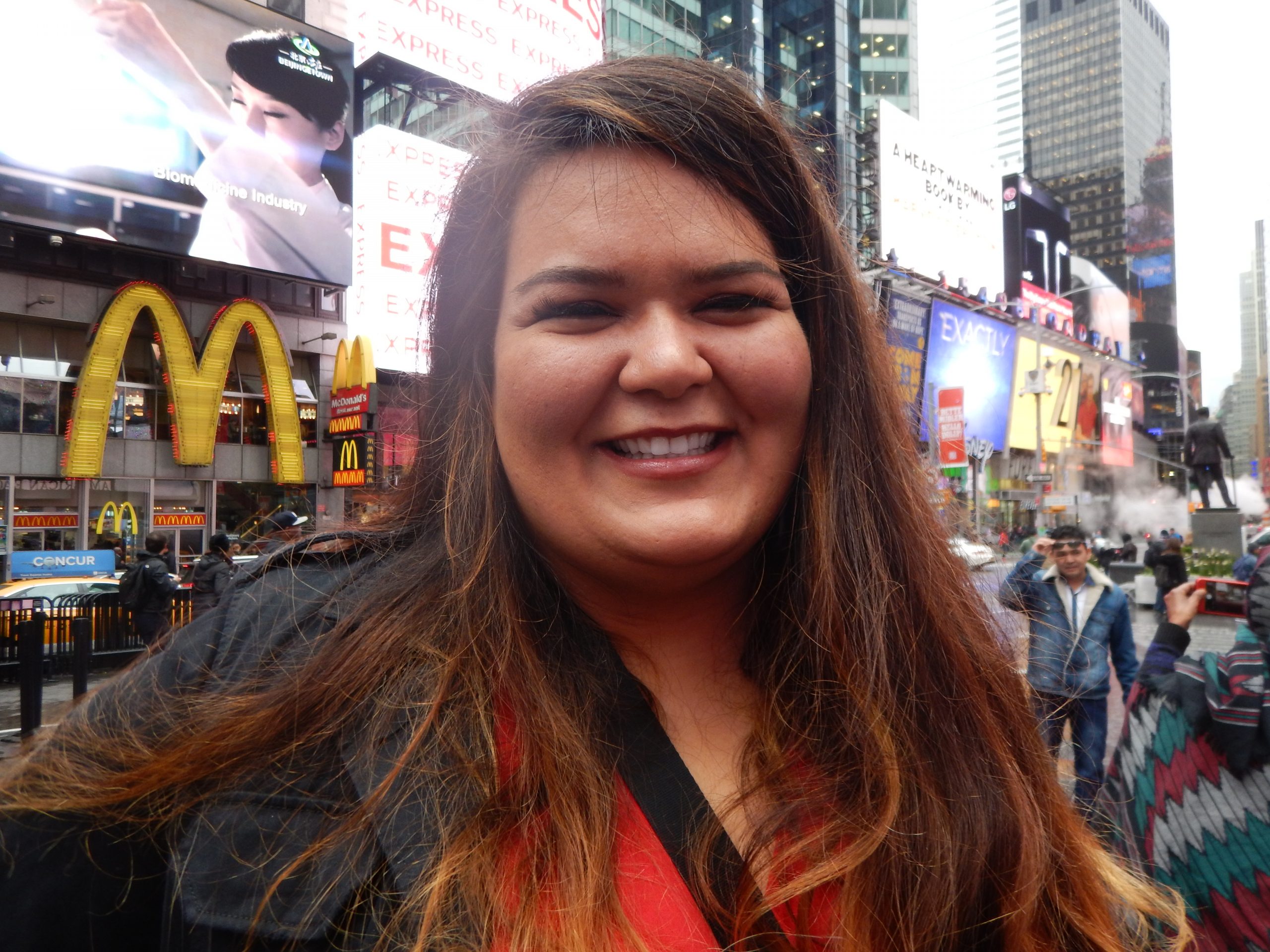 Robin in Time Square in NYC