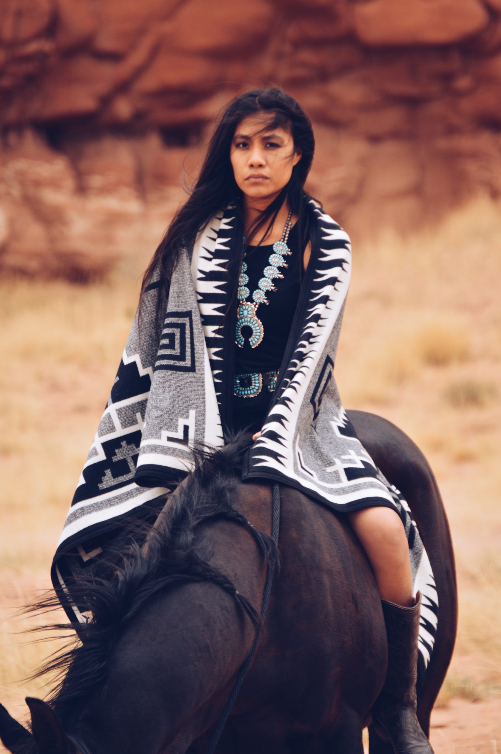 American Indian College Fund Blanket on a model on a horse