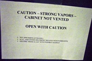 A sign warning of specimens.