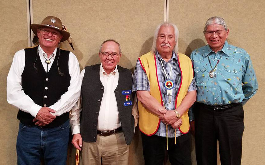 John Gritts, far right, is pictured with several leaders in the tribal college and university movement. From left: Richard Williams, former President of the American Indian College Fund; Rick, Lowell Amiotte, former President of Oglala Lakota College; and Lionel Bordeaux, former President of Sinte Gleska University, in Rapid City, South Dakota.