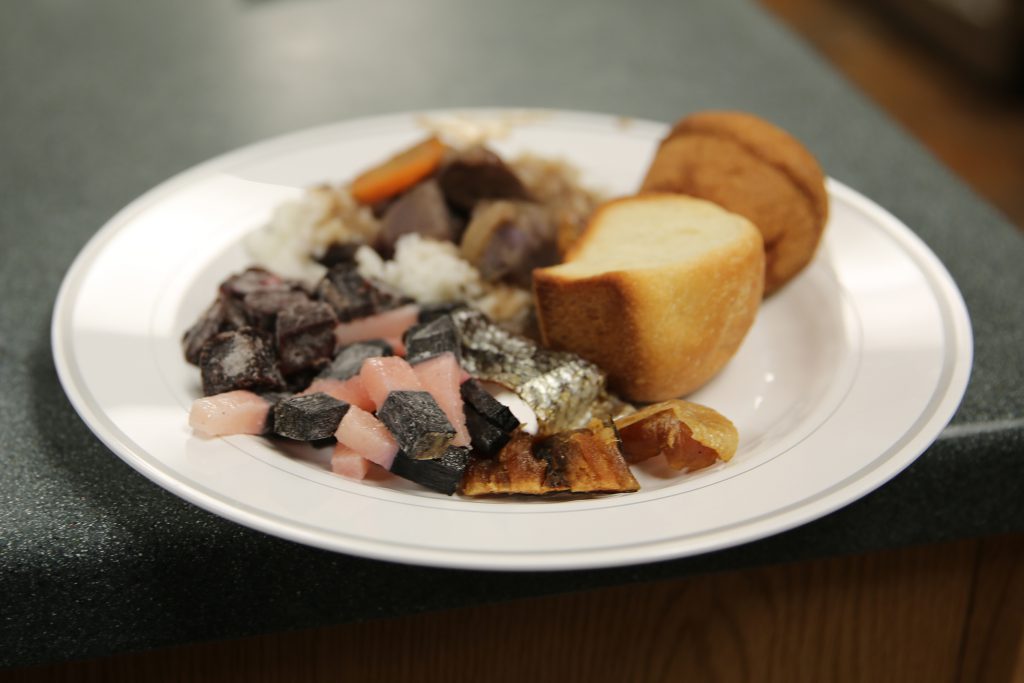 locally harvested foods such as tuttu (caribou), maktak (bowhead whale blubber), pivsi (dried fish), and aġvik quaq (frozen raw whale meat)