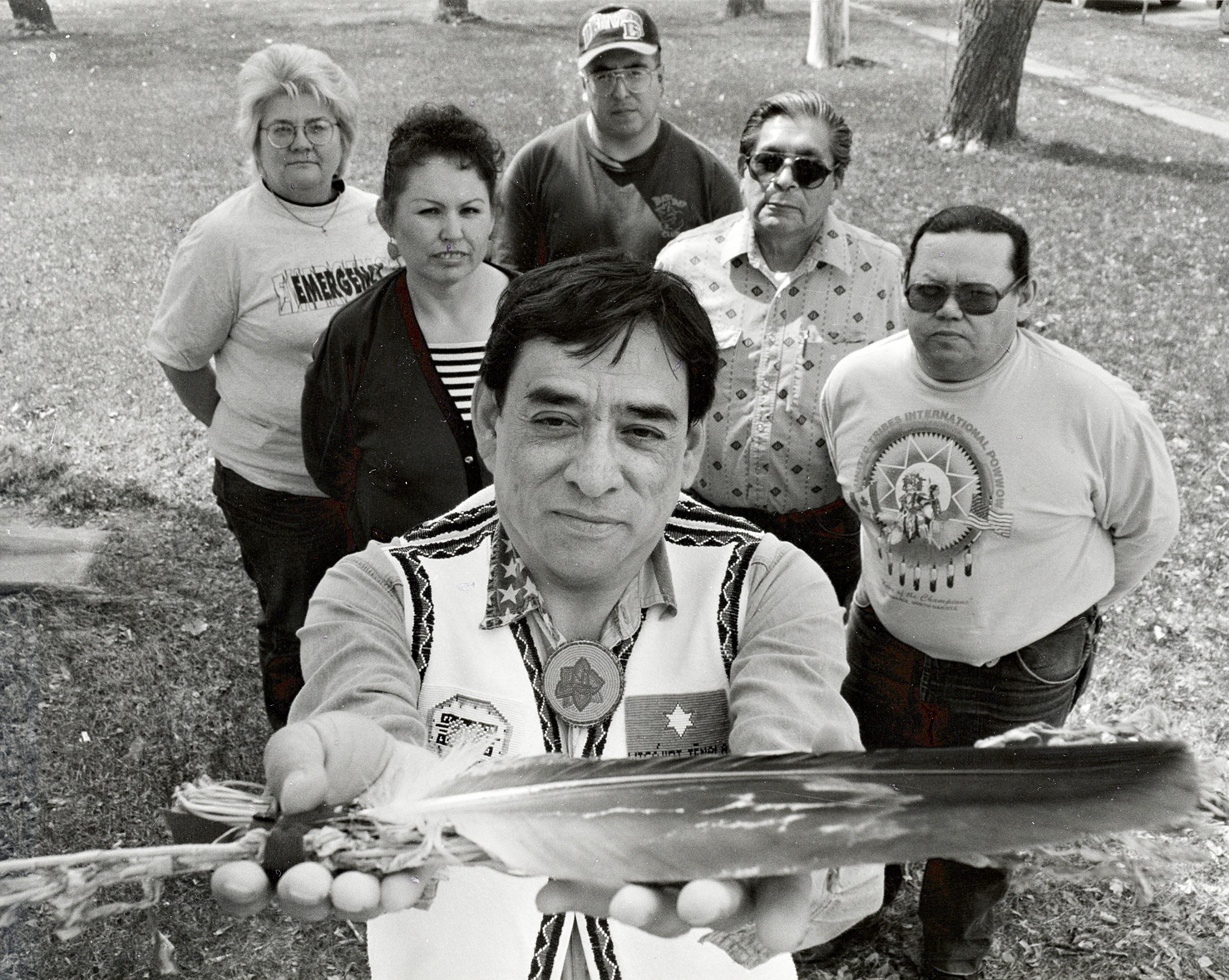 Dr. David Gipp (holding eagle feather) was one of the founders of the tribal college movement.