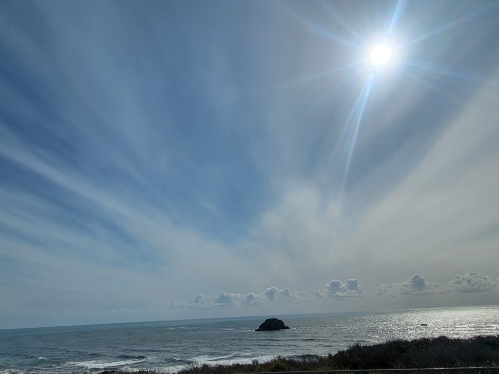 The sun and rock at the lookout at Taholah, Wash.