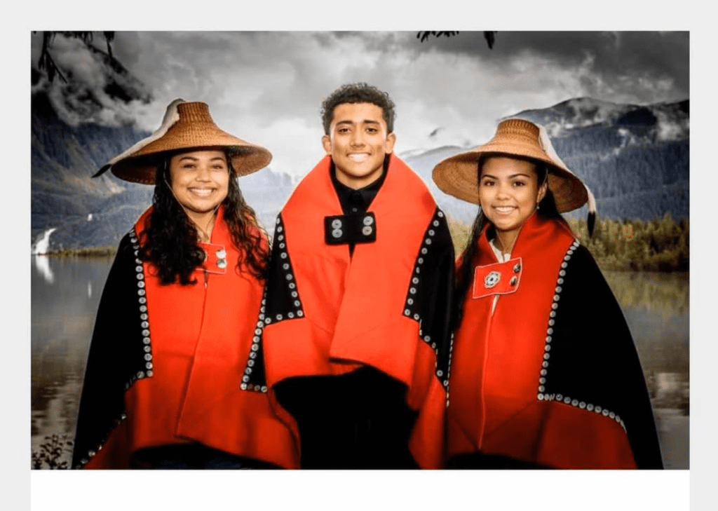 Jade, Antone, and Maya Araujo in their Tlingit regalia