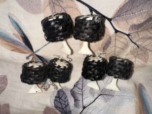 Baleen basket earrings with ivory starter and toppers that Ira made.