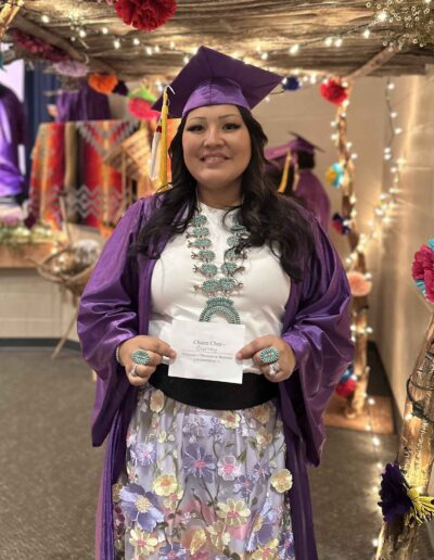 Charm Native student graduation regalia