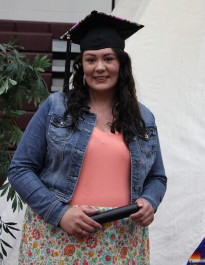 Darian Native student graduation regalia