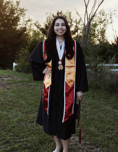 Kylie Native student graduation regalia
