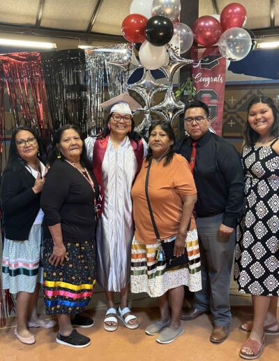 Louise Native student graduation regalia
