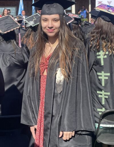 Maunis Native student graduation regalia