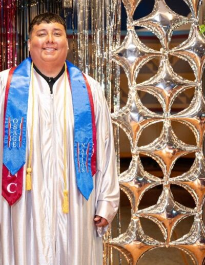 William Native student graduation regalia