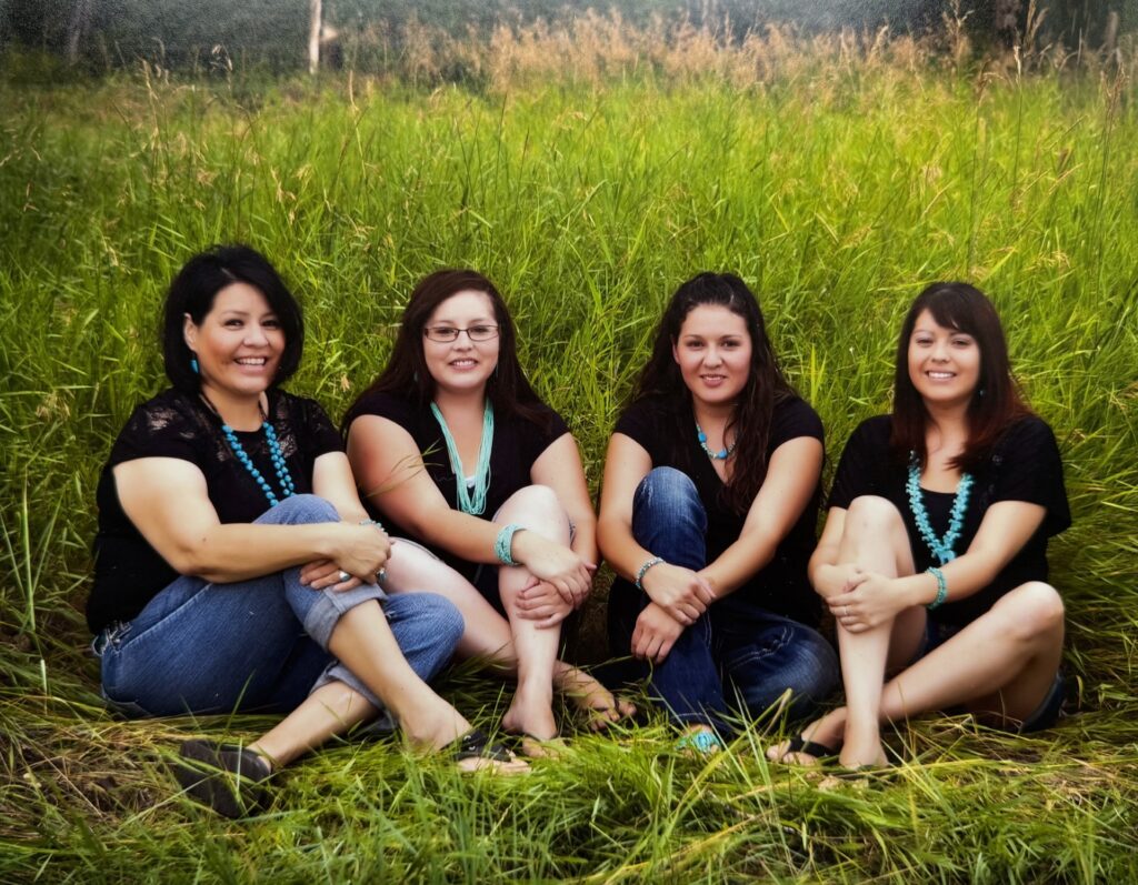 Melarie’s mother Dorcus, middle sister Keirsten, herself and little sister Kerrera at Two Leggins near the Big Horn River in St. Xavier, Montana.