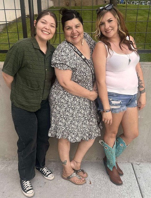 Kimberly with her daughters.