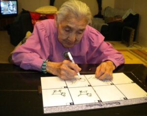 Yitanibah Lee playing Pictionary with us grandchildren. 